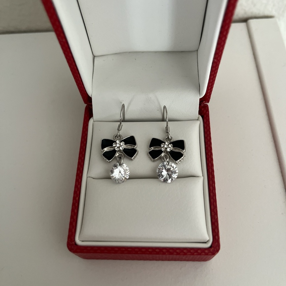 Elegant Black and Silver Bow Earrings